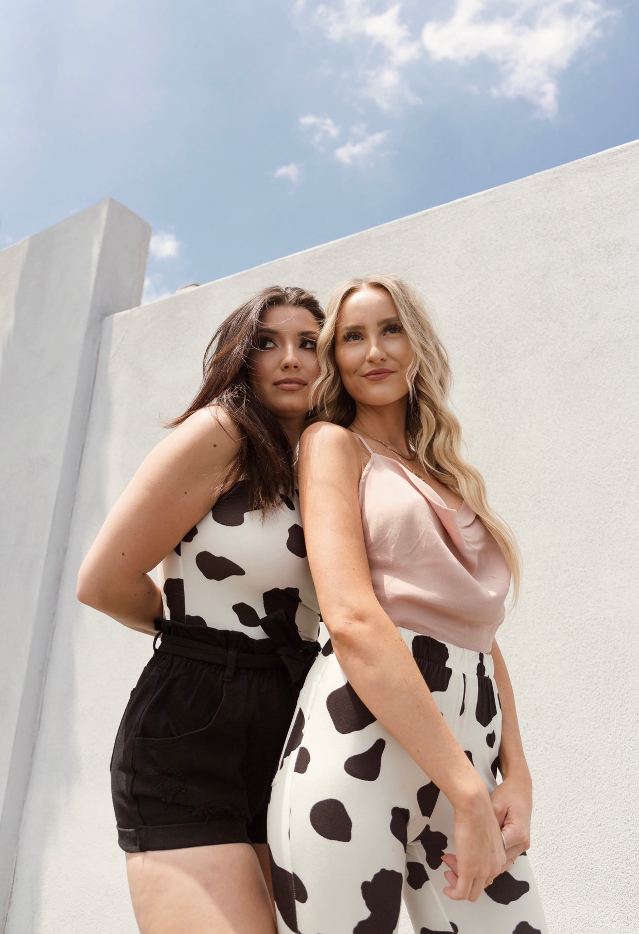 Moody Cow Print Bodysuit
