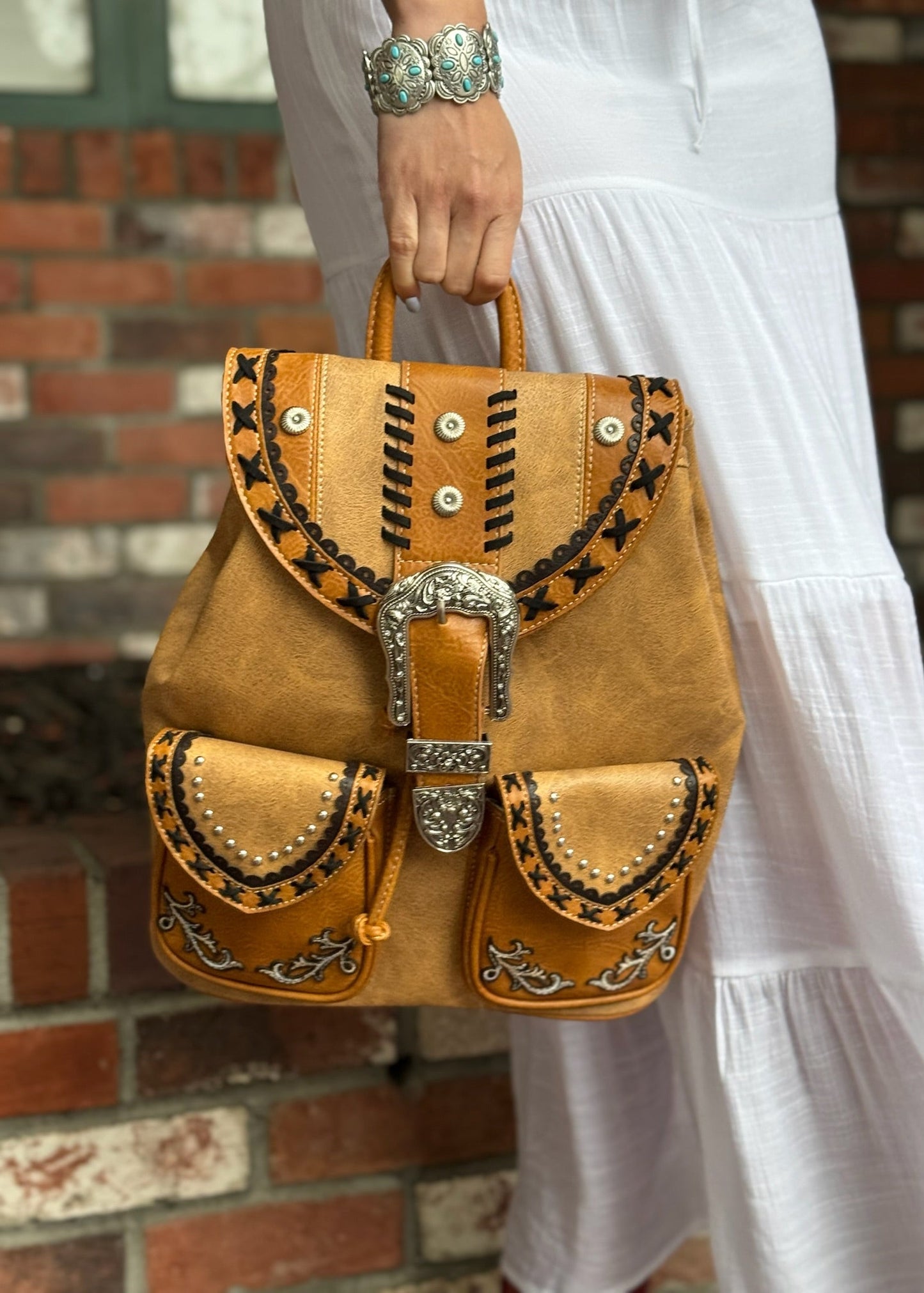 Western Leather Buckle Backpack