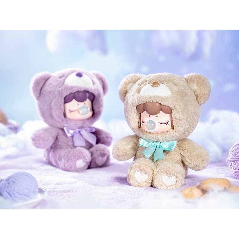 Two teddy bears, one purple and one beige, with cartoon faces on a soft, light-colored background.